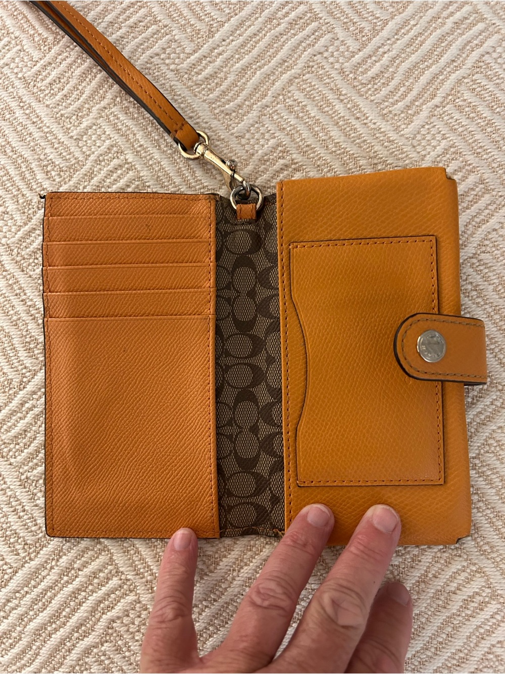 Coach wristlet wallet with snap closure. Yellow/orange pebbled leather. EUC - Picture 5 of 9